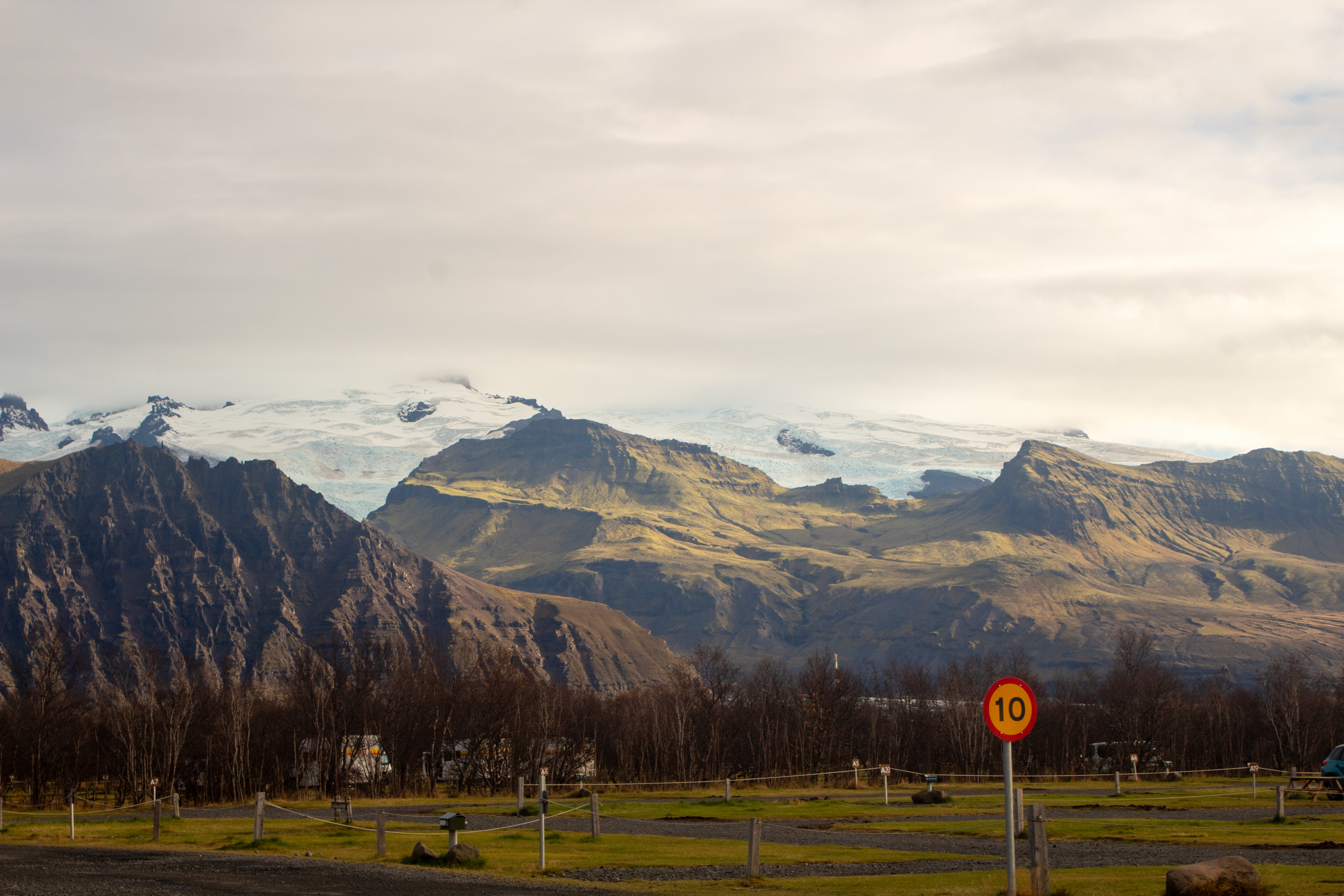 Mountains with speed sign